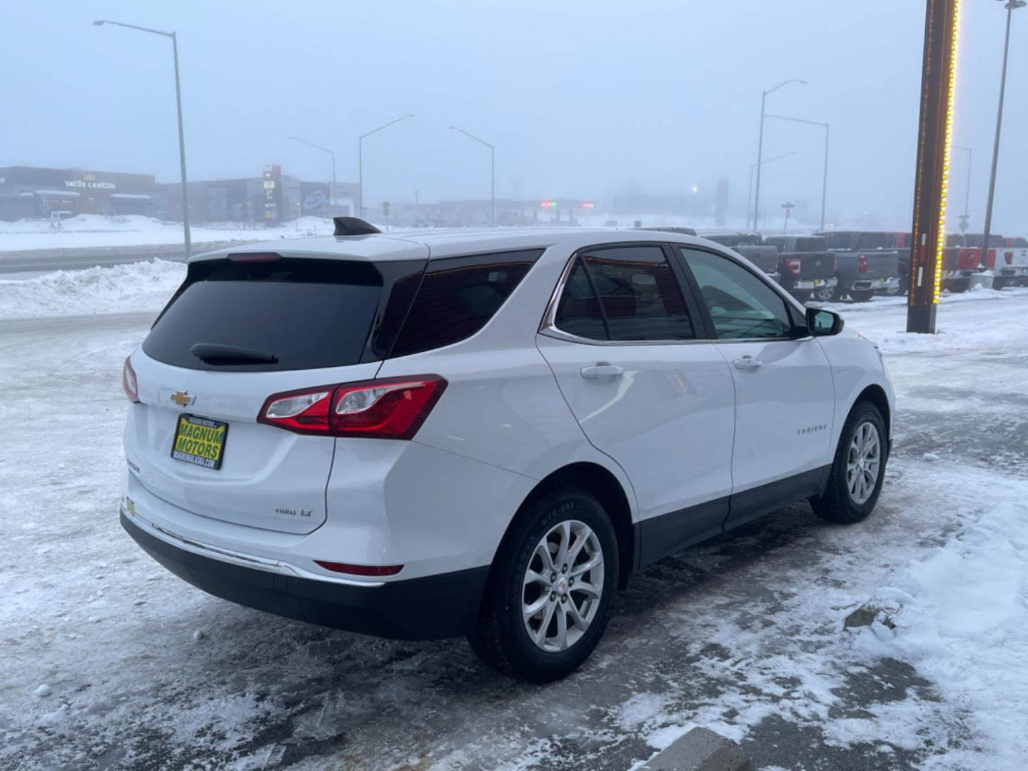 2021 Chevrolet Equinox LT AWD (2GNAXUEV8M6) with an 1.5L L4 DOHC 16V TURBO engine, 6A transmission, located at 1960 Industrial Drive, Wasilla, 99654, (907) 274-2277, 61.573475, -149.400146 - Photo#4